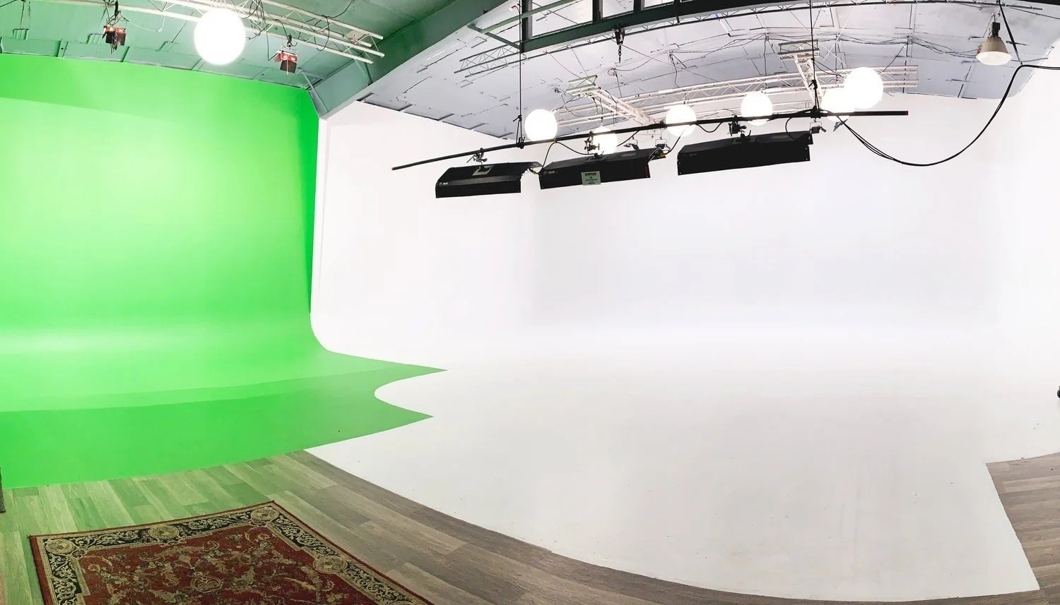 Green screen meets white cyc — split stage view
